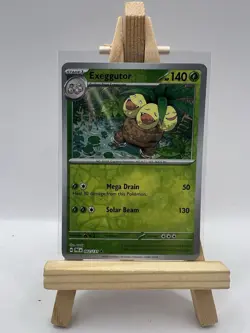 Exeggutor 002/131 Reverse Holo Card : Pokemon TCG Prismatic Evolutions - Image 1