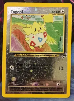 Togepi 4/18 Southern Islands Reverse Holo LP With 2 Swirls - Image 1