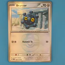 BRONZOR (MASTER BALL PATTERN) 066/131 HOLO PRISMATIC EVOLUTIONS POKEMON HOLO NM - Image 1