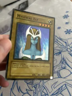 Mystical Elf LOB-062 WAVY SLIGHTLY SATURATED Unlimited Super Rare YU-GI-OH LP - Image 1