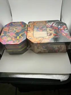 2 -Pokemon Sealed Tin Box Charizard/ Koraidon - 9 Booster Packs - 2 Foil - Image 1
