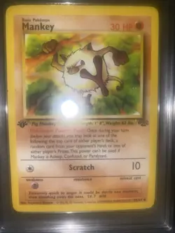 Mankey 55/64 Jungle Regular First Edition GRADED 8 PGC Pokemon card 1999 - Image 1