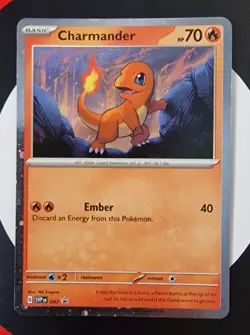 Charmander - 047 (Cosmos Holo) 047 Sv: Scarlet & Violet Promo Cards Holo - Image 1