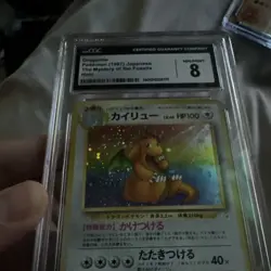 Pokemon TCG 1997 Mystery of the Fossils Dragonite 149 Holo Japanese CGC 8 - Image 2