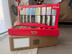 Pokemon TCG - Prismatic Evolutions 8 Mini-Tins w Promo Cards - Costco Exclusive - Image 1