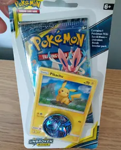 Pokemon TCG Sun & Moon Unbroken Bonds Blister Pack Pikachu Holo Promo with coin - Image 1
