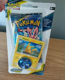 Pokemon TCG Sun & Moon Unbroken Bonds Blister Pack Pikachu Holo Promo with coin - Image 2