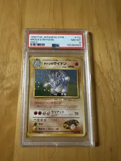 1998 Japanese Pokemon Card Brock's Rhydon #112 Gym Set Holo PSA 8 NM-Mint - Image 1
