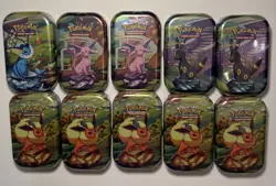 Pokemon TCG: Scarlet & Violet Prismatic Evolutions Mini tins. Assortment of 10. - Image 1