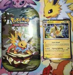 Prismatic Evolutions Jolteon Mini Tin Sealed W/ Jolteon Cosmo Holo Promo Card - Image 1