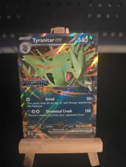 Pokemon Card Tyranitar Ex #64 (Prismatic Evolutions Stamp) Holo - Image 1