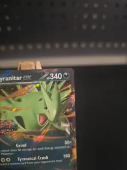 Pokemon Card Tyranitar Ex #64 (Prismatic Evolutions Stamp) Holo - Image 3