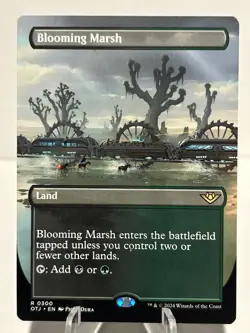 Blooming Marsh (Borderless) 300 R Outlaws of Thunder Junction NM MTG - Image 1