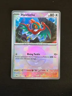 Hawlucha (Poke Ball Pattern) 089/131 Prismatic Evolutions Pokemon Holo LP - Image 1
