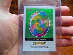 MetaZoo Topps Chrome Chaos Crystal Green Refractor Card Cryptid Camera 28/99 - Image 1