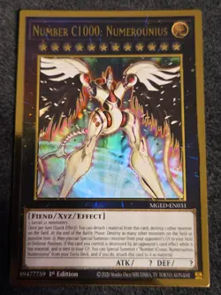 YUGIOH: 1X Number C1000: Numerounius MGED-EN031 Premium Gold Rare NM - Image 1