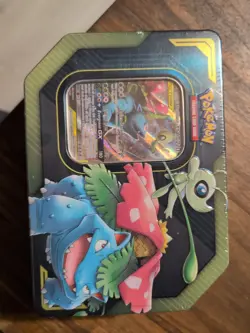 Pokemon TCG Celebi & Venusaur GX Tag Team Tin Sealed - Image 1
