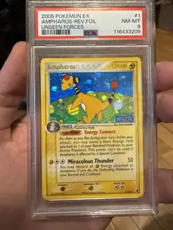 2005 POKEMON EX UNSEEN FORCES #1 AMPHAROS-REVERSE FOIL PSA 8 - Image 1
