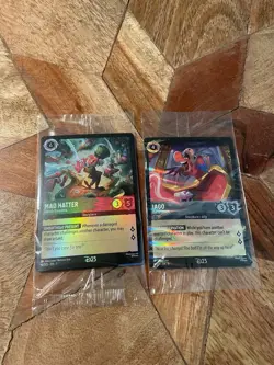 D23 Exclusive Lorcana Cards 2025 And 2026 Mad Hatter & Iago - Image 1