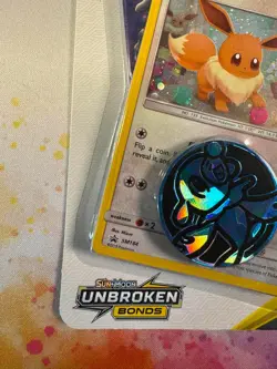 Pokemon TCG Sun & Moon Unbroken Bonds Blister Pack Eevee Holo Promo SM184 Coin - Image 5