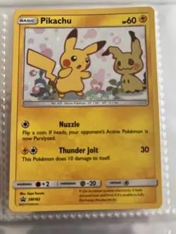 Pokemon TCG Pikachu and Mimikyu Promo SM162 Holo Card NM - Image 1