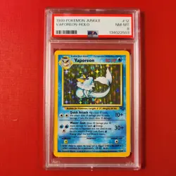 6-02-02 . UNPLAYED 1999 POKEMON JUNGLE VAPOREON HOLO #12/64 PSA 8 - Image 1