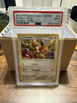 Pokemon Hidden Fates Eevee Holo #48 PSA 9 Near Mint - IN HAND READY TO SHIP - FS - Image 1