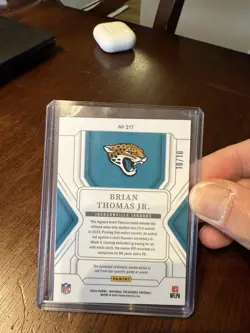 2024 Panini National Treasures Brian Thomas Jr. RC Rookie Patch GOLD /10 Bookend - Image 2