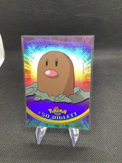 1999-2000 Topps Pokemon Diglett #50 Rainbow Foil - Image 1
