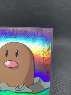 1999-2000 Topps Pokemon Diglett #50 Rainbow Foil - Image 3