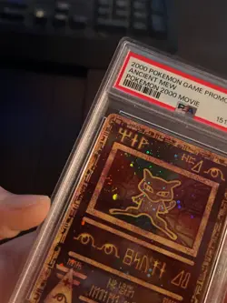 SWIRL + PSA 9 FRESH CERT Vintage Ancient Mew 1 Pokemon Movie Holo Card - Image 1
