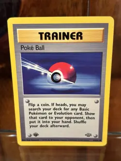 Poke Ball 1st Edition 64/64 Jungle Set Pokemon Card NM - Image 1