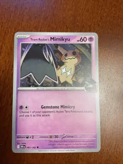 Team Rocket’s Mimikyu 087/182 Destined Rivals Regular Pokemon TCG Card - Image 1