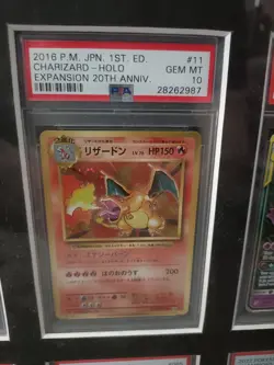 Charizard 011/087 - PSA 10 JPN 1st Edition 20th Anniversary Pokemon Card - Image 1