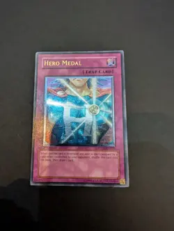 Yugioh Hero Medal STON-EN050 1st Edition Ultimate Rare Excellent Condition - Image 1