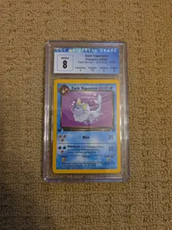 Pokemon 2000 Dark Vaporeon Team Rocket - 1st Edition 45/82 CGC 8 - Image 1