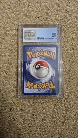 Pokemon 2000 Dark Vaporeon Team Rocket - 1st Edition 45/82 CGC 8 - Image 2