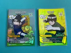 Sasuke Uchiha and Rock Lee 1st Edition Cards Naruto Mythos - Image 1