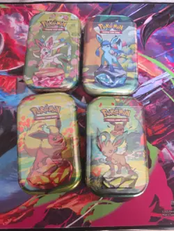 Pokemon TCG Scarlet & Violet Prismatic Evolutions Mini Tin x4 - NEW SEALED - Image 1