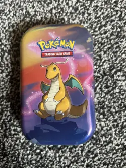Pokemon mini tin with 47 genuine cards including holos/reverse dragonite - Image 1