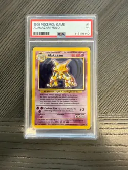 1999 POKEMON BASE SET UNLIMITED #1 ALAKAZAM-HOLO PSA 1 - Image 1