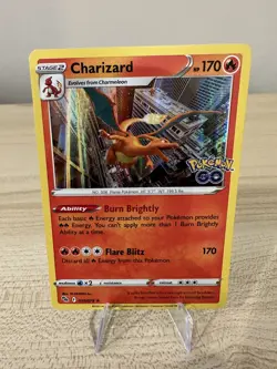 Pokemon TCG Charizard Reverse Holo Rare Card 010/078 Pokemon Go NM - Image 1