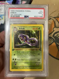 The Pokemon Company Fossil 1st Edition Arbok 31/62 PSA 9 English Regular - Image 1