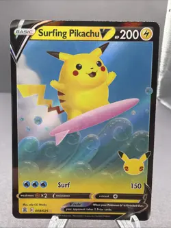 2021 POKEMON SURFING PIKACHU V 008/025 HOLO CARD - Image 1