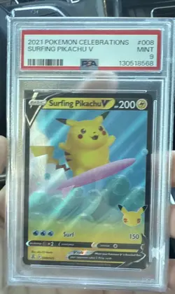 Pokemon Surfing Pikachu V 008/025 Celebrations PSA 9 - Image 1