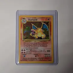 1999 Pokemon TCG Charizard Base Set Holo Unlimited Rare Card 4/102 MP/DMG - Image 1
