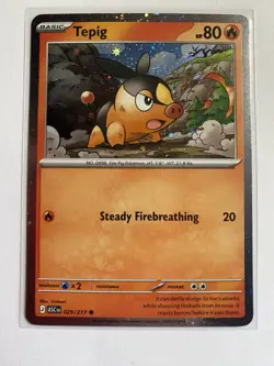 Tepig (Cosmos Holo) 029/217 Holo Cards & Products Pokemon NM Booty Swirl - Image 1