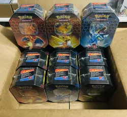 Pokemon Hidden Fates Case of 12 Tins (4 of each art - Charizard Gyarados Raichu) - Image 1