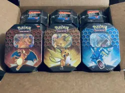 Pokemon Hidden Fates Case of 12 Tins (4 of each art - Charizard Gyarados Raichu) - Image 3