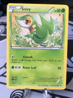Pokemon Legendary Treasures: Radiant Collection Snivy Common RC1/RC25 NM-LP - Image 1